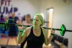 woman holding weight bar